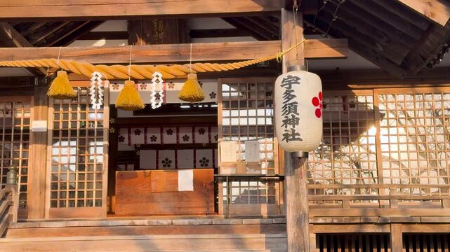 Traditional Wooden Shinto Shrine Architecture with Shimenawa Rope and Lantern in Kanazawa