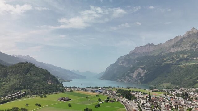 Scenic aerial view of rural countryside and Alpine mountain landscape near Flums, Berschis and Walenstadt on Lake Walensee, in the canton of St. Gallen, Switzerland