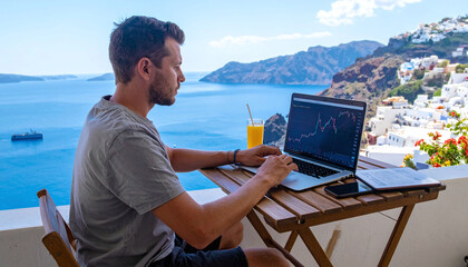 Obraz premium A young entrepreneur manages investments from a Santorini terrace. Capturing the digital nomad lifestyle, this highquality photo signifies financial independence and remote success.