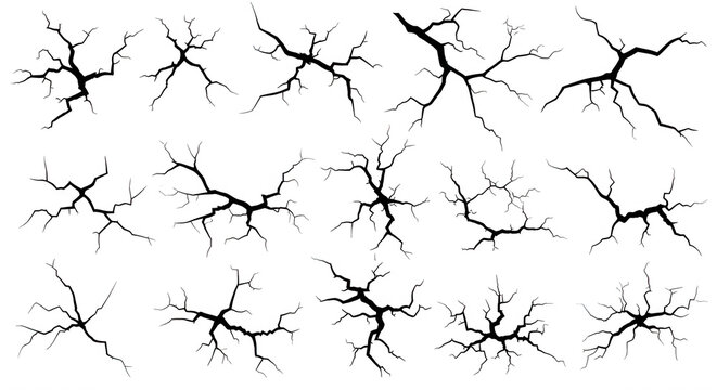 A collection of white line crack patterns isolated on a solid black background, featuring various jagged fracture shapes and spiderweb textures