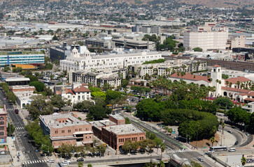 Obraz premium California Los Angeles September 4, 2025 Panoramic view of city with houses, mountains and clouds on clear sunny day in California