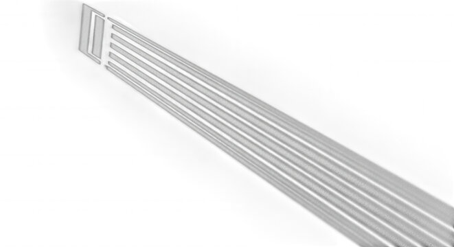A diagonal beam of light with parallel white stripes extending from a dark corner against a solid black background
