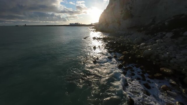 FPV Aerial Drone View of the White Cliffs of Dover at Sunset