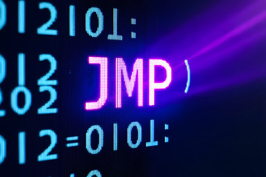 Abstract representation of computer code with a glowing JMP command.