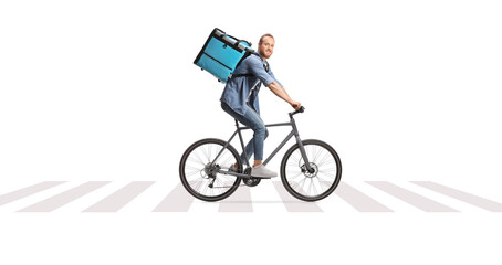 Obraz premium Food delivery man riding a bicycle with a thermal bag