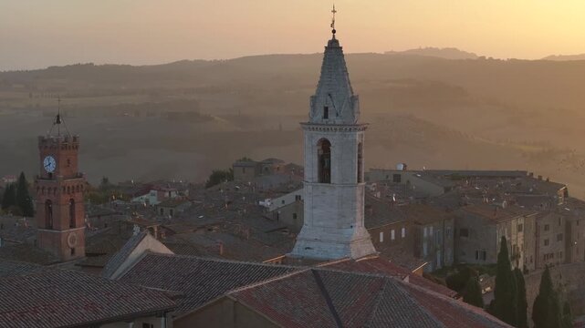 Old Italian city at Morning Sunrise Light. Aerial view in Tuscany, Italy. Historic Pienza Town On a Hilltop at Sunrise.