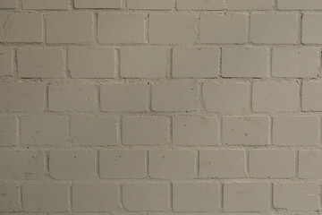 Fototapeta premium A textured background of neutral gray concrete blocks, perfect for design.