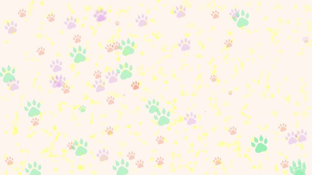 Scattered colorful paw prints on a light background, creating a playful and decorative pattern. Looping video