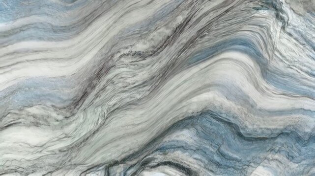 Animated abstract background of blue and white marble veins flowing in a sophisticated pattern.