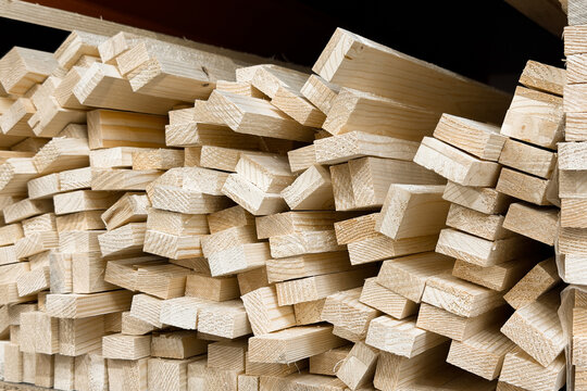 Pile of cut lumber stacked for storage