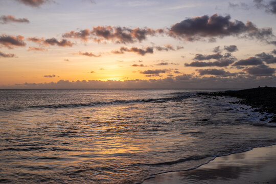 Amazing colorful sunset over the Ponta Preta beach (Black tip beach) on the southern part of the beautiful island of Sal in Cape Verde. The popular beach is isolated and deserted but gives amazing vie