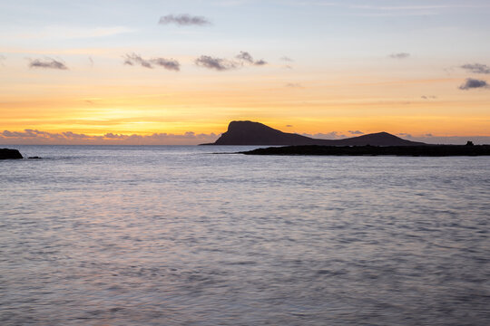 A beautiful sunset full of colors on Murdeira Beach, which is a quiet, scenic sandy and rocky cove located on the sheltered west coast of Sal Island, Cape Verde. The beach is located inside a protecte