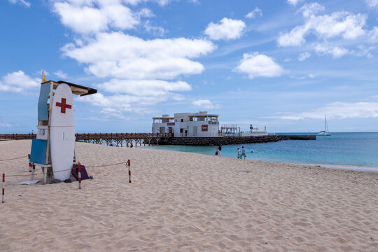 The famous Bikini Beach on Sal Island with the unique wooden pier, the shallow turquoise waters and the golden sand beach, making this a idllyic beach destination to relax and feel the "no stress" att