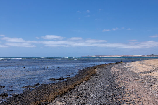 The beautiful beach of Ponta Preta (English translation: Black Beack) is a tranquil part of Sal Island in Cape Verde without many tourists but with a perfect golden sand beach and turqiouse water crea