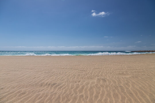 The beautiful beach of Ponta Preta (English translation: Black Beack) is a tranquil part of Sal Island in Cape Verde without many tourists but with a perfect golden sand beach and turqiouse water crea