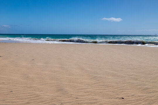 The beautiful beach of Ponta Preta (English translation: Black Beack) is a tranquil part of Sal Island in Cape Verde without many tourists but with a perfect golden sand beach and turqiouse water crea
