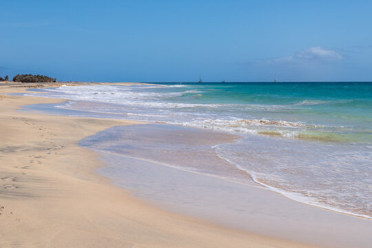 The beautiful beach of Ponta Preta (English translation: Black Beack) is a tranquil part of Sal Island in Cape Verde without many tourists but with a perfect golden sand beach and turqiouse water crea