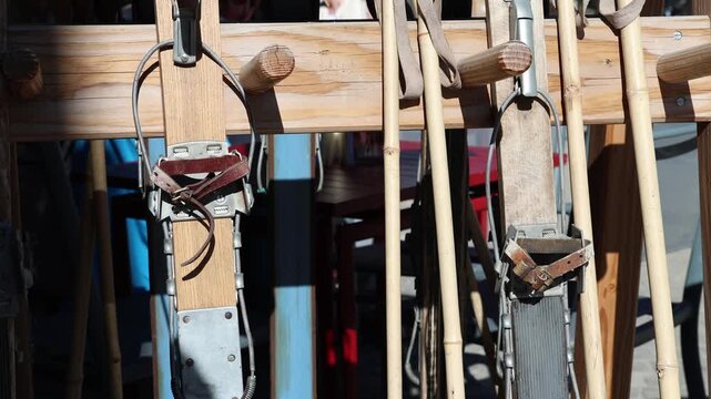 Old wooden skis with metal bindings, close up