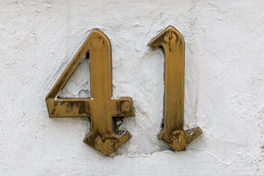 house number 41 at white wall