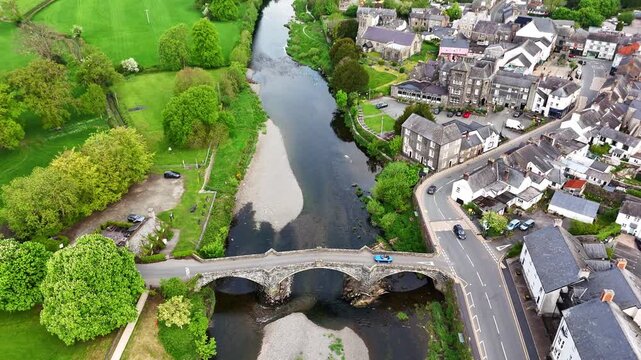 Aerial Tilt-Up Reveal of the River Conwy and Llanrwst Townscape, North Wales