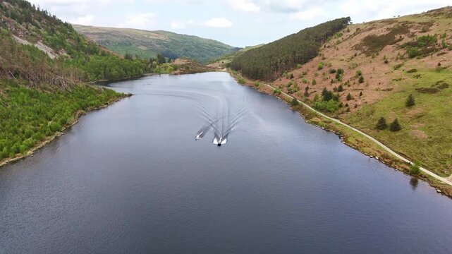 Aerial Follow Shot of Water-Skiing on Llyn Geirionydd, Eryri (Snowdonia), North Wales