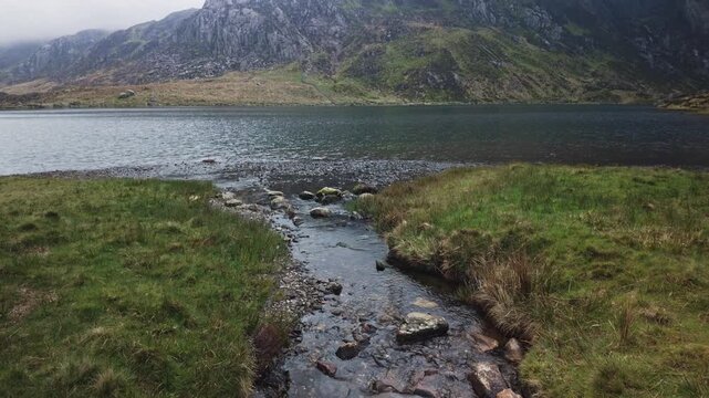 Cinematic reveal of Llyn Idwal and the Glyderau Mountains, Eryri (Snowdonia)
