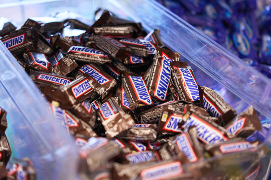 Tyumen, Russia-March 20, 2026: Snickers chocolate candies with shallow depth of field, highlighting the iconic logo