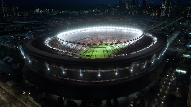 Aerial Shot: Soccer Championship Match at Packed Football Stadium at Night, With Fans Cheer at Decisive Final Cup  in Big Arena. Cinematic Moving Drone Overhead Aerial.