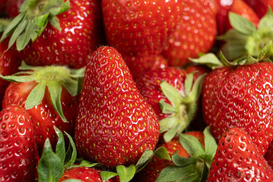 Summer organic strawberries background for food design