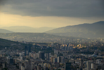 Naklejka premium Panoramic aerial cityscape sunset view of Tbilisi, the capital of Georgia