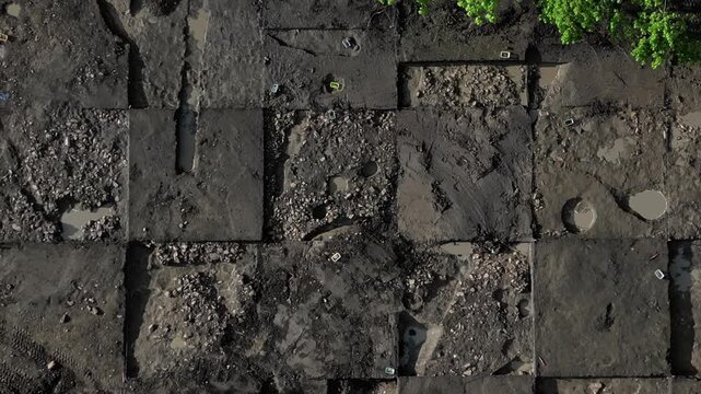 ceramic kiln stone. professional archaeological excavation in progress. sharp, clean edges and geometric patterns soil aren't accidental systematic method used to reveal history hidden beneath surface