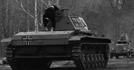 Fototapeta premium Historical Re-enactment Black And White Video. After Battle. Re-enactor