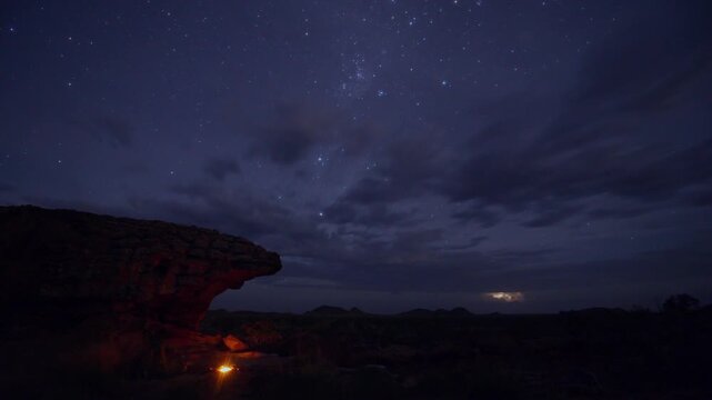 Australia's Southern Skies Milky Way Galaxy Outback Landscape Time LapseTimelapse Night skies Star lapse Northern Territory Uluru KimberliesWestern Australia campfire large red rock landmark clouds
