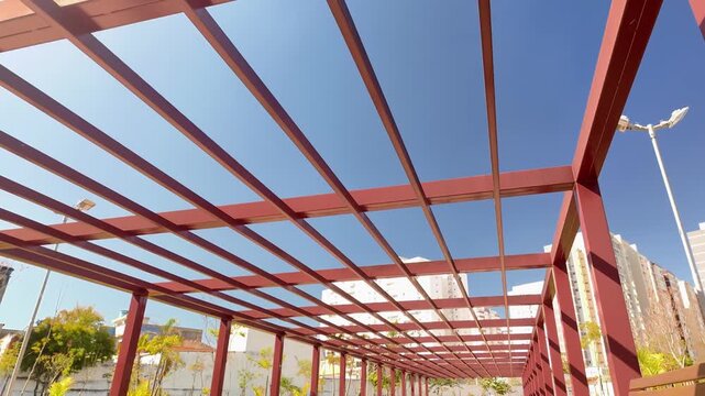 Red Steel Pergola Against Blue Sky, S&atilde;o Paulo Urban Park