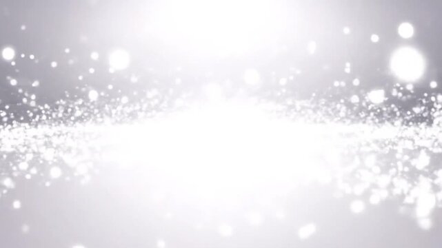 Bright sparkling white particles flowing and expanding towards a glowing central light source creating a dreamy backdrop