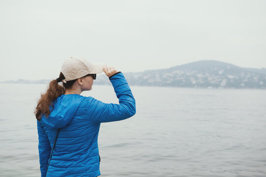 Traveler enjoying peaceful seaside scenery