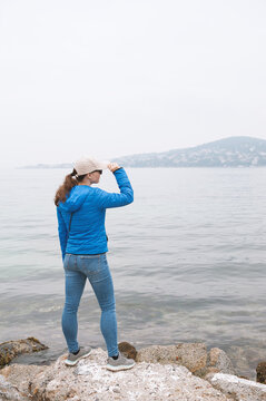 Traveler enjoying peaceful seaside scenery