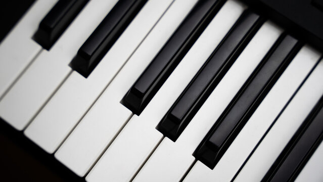 cinematic close up of piano keys
