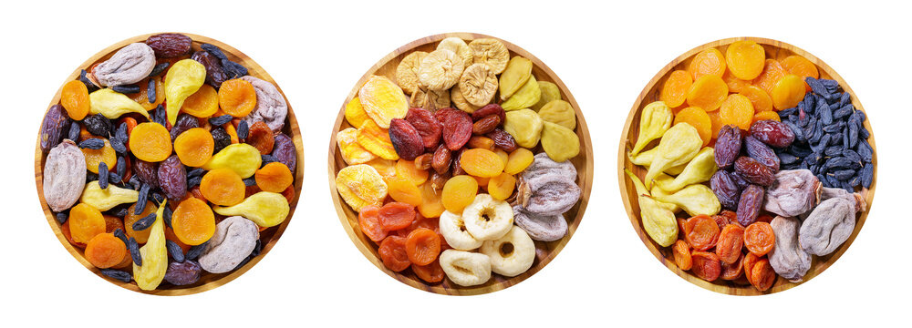 Set of various plates of dries fruits isolated on transparent background, top view