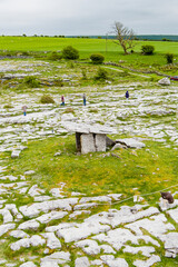 Obraz premium Aerial view of Poulnabrone Dolmen in the Burren karst landscape, County Clare, Ireland. Neolithic portal tomb on the Wild Atlantic Way.