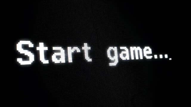 Start game retro pixel text on a dark vintage computer monitor screen with a cursor.