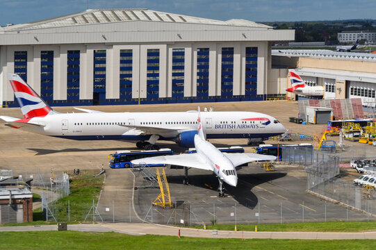 London, England, UK - 18 April 2026: British Airways maintenance hangar at Heathrow airport. In the foreground is one of the airline's Boeing 787 aircraft (G-ZBKG) and  Concorde jet (G-BOAB)