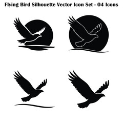 Obraz premium Set of Majestic Flying Bird Silhouettes - Minimalist Flying Bird Vector Icons for Nature and Wildlife Design
