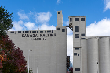 Fototapeta premium Toronto, Canada-October 16, 2024: Canada Malting Silos, built in 1928, is one of two remaining silos in Toronto. It was abandoned in the 1980s. and it is designated a heritage site.