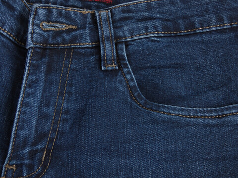 Front Pocket and Waistband of Dark Blue Denim Jeans with Bar Tack Stitch