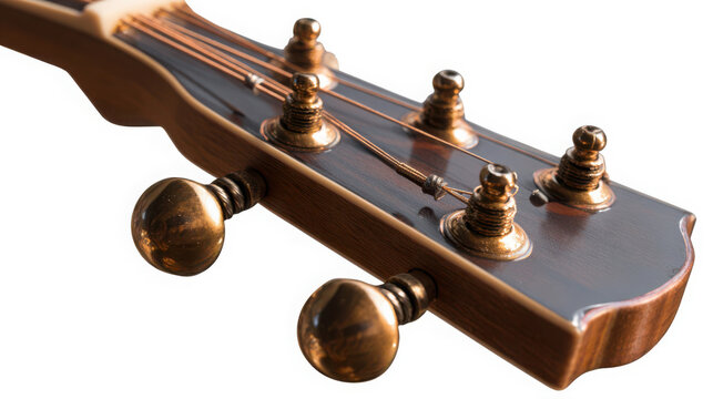 Closeup of a guitar headstock with brass tuning pegs isolated on white background