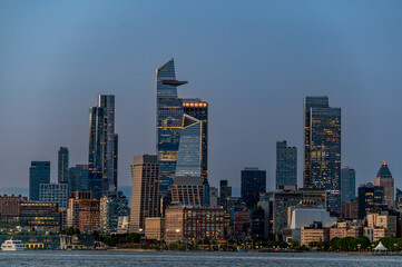Hudson Yards Evening Skyline Across Hudson River. Evening view of Hudson Yards skyline across...