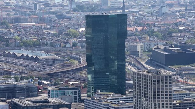 Prime tower skyscraper overlooking zurich cityscape and train station