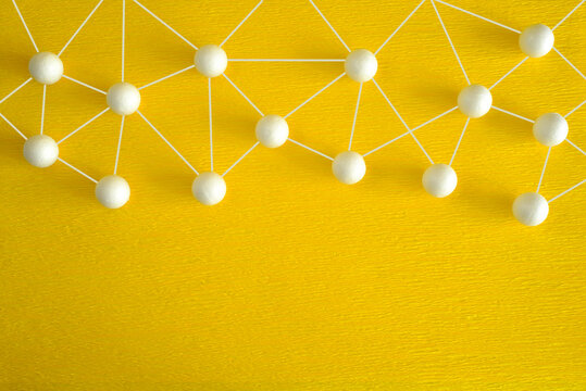 network structure with connected people, showing teamwork capabilities,collaboration, stakeholder mapping, ideas,innovation and business communication, analysis and planning of business on yellow back