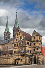Fototapeta premium Alte Hofhaltung or Old Court complex in Bamberg, Germany. Historic medieval buildings and stone walls under cloudy sky